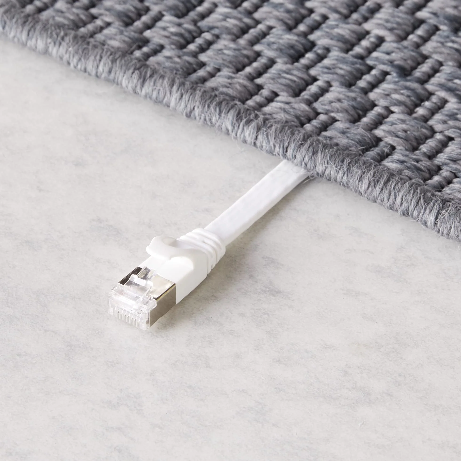 Amazon Basics RJ45 Cat 7 Ethernet Patch Cable, Flat, 600MHz, Snagless, Includes 15 Nails, 30 Foot, White 30-Foot 1 - Image 4