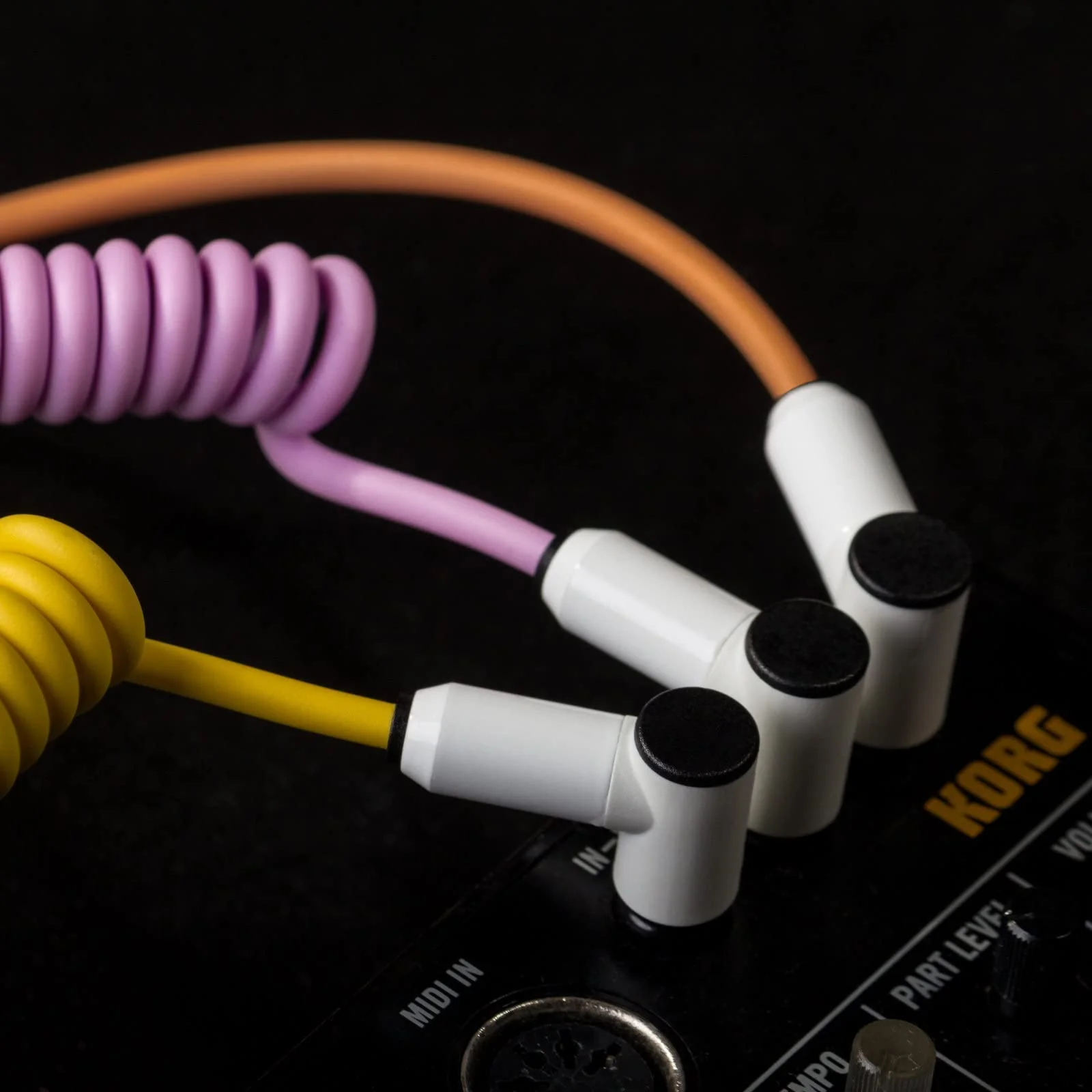 MyVolts Candycord Audio Cable, Angled Mini Jack to Angled Large Jack, Curly 100cm to 200cm, Sunset Peach Colour - Image 3